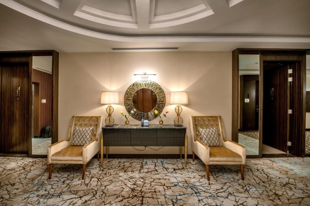 Nivel Hotel Abha Хамис-Мушайт Экстерьер фото The interior of a suite at the Ritz-Carlton, DIFC