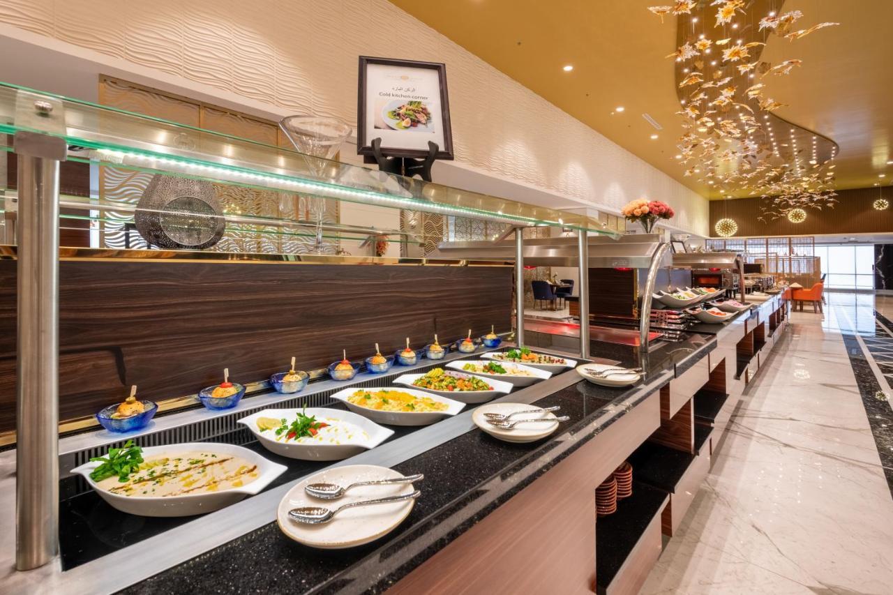 Nivel Hotel Abha Хамис-Мушайт Экстерьер фото A buffet at a hotel